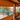 Cortina Panorámica de PVC Naranja ojetillos